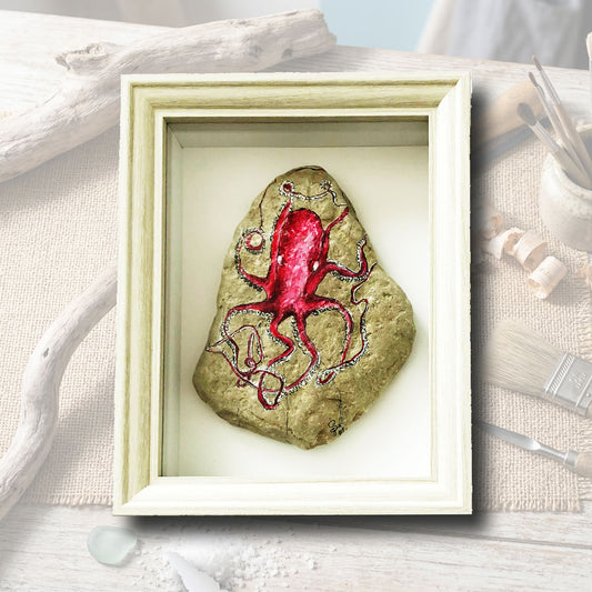 Galet volcanique brut peint à la main avec un poulpe rouge vibrant, cadre coffret bois blanc 15x21cm, artisanat d'art Auvergne L'Atelier du Ressac.